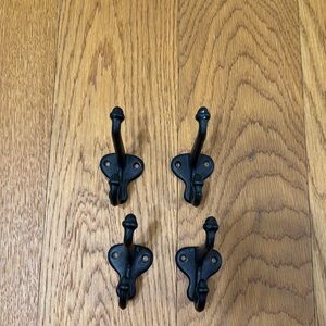 Set of 4 black enamel acorn double wall storage hooks from Rejuvenation